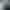 Black and white headshot of writer Jan Beatty in front of a crosswalk.