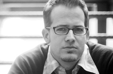 Black and white headshot of poet Brian Barker.