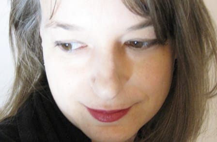Tight cropped headshot of poet Karin Gottshall.