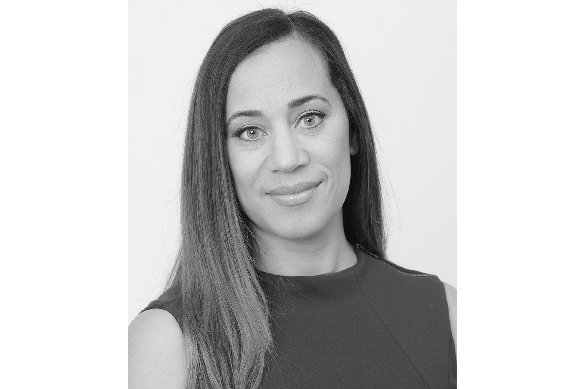Black and white portrait of trustee Andrea Wishom.