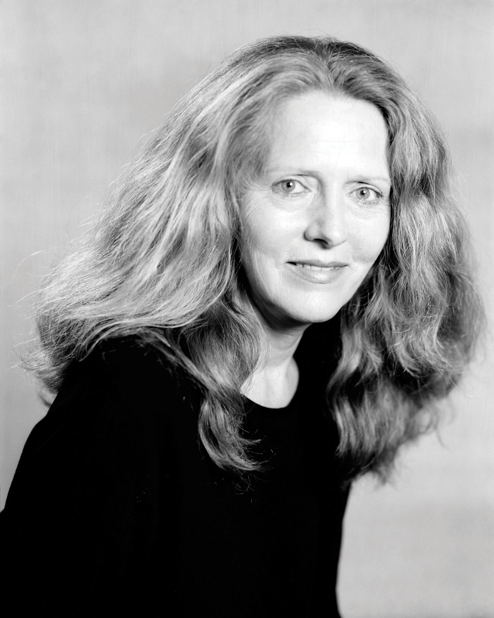 Black and white portrait of Linda Gregg.